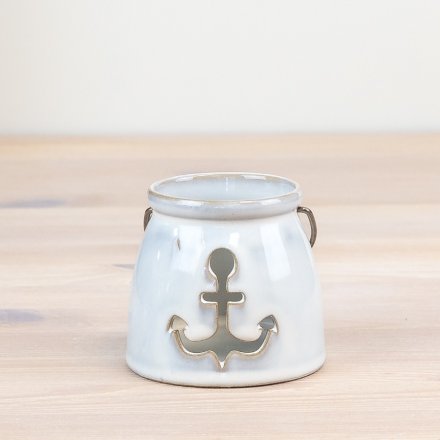 Illuminate your home with elegance and coastal charm with our Anchor Cut-Out Candle Cup.