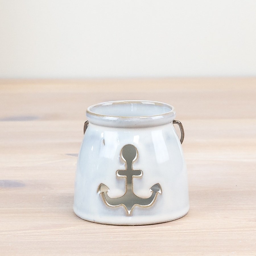 Add some coastal charm to your home with our Anchor Cut-Out Candle Cup for a touch of elegance and soft illumination.