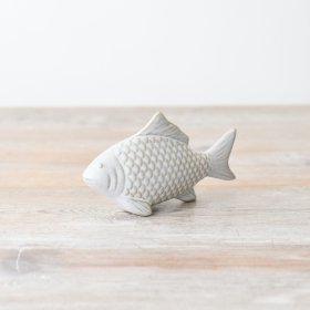 Enliven your decor with this delightful fish ornament for a touch of coastal charm.