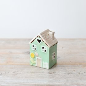 Decorate your home with a charming little house. 