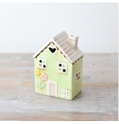 create a cosy absence with this stunning light up house