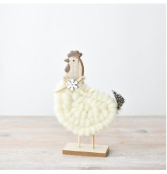 Add a touch of rustic charm to your home decor with our adorable wool hen