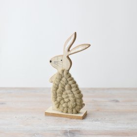 Make spring extra festive with our lovable wool rabbit on a charming wooden base!