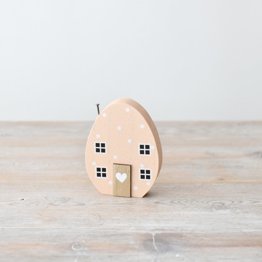 Liven up your Easter decor with our charming Wooden Egg House Deco!