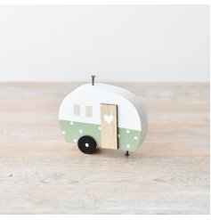 Get ready to wander with our charming Wooden Caravan Ornament - the perfect addition to your home decor!