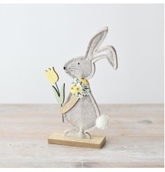 Add some Easter charm to your home with our delightful Fabric Bunny on a Wooden Base, 