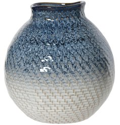 Beautiful glazed vase in striking blue and white hues - perfect for displaying your favourite flowers.