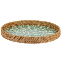 elevate your entertaining game with this round rattan tray 