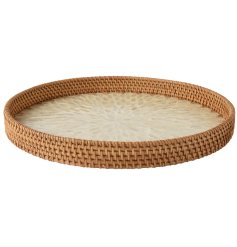 a stylish round rattan serving tray