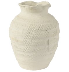 Enhance your home decor with this refined vase, adding a touch of sophistication and style to any room