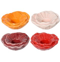 Illuminate your space with the delicate beauty of our Porcelain Flower Candleholder 