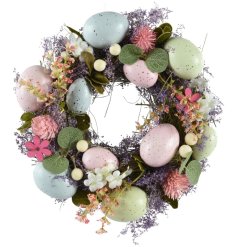 Decorate your door with a beautiful Easter wreath that adds a touch of festive charm. 