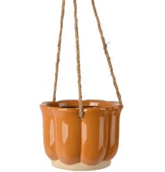 "Upgrade your home decor and add a touch of sophistication with our Hanging Planter Stoneware 