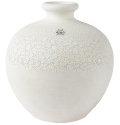 Embrace the beauty of nature with this elegant clay vase in pure white. A gorgeous addition to any home decor.