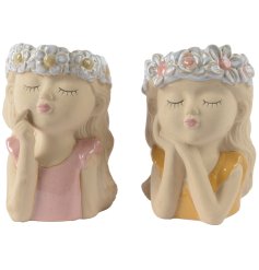 Bring charm to your home with our Stoneware Girl Head Planter 