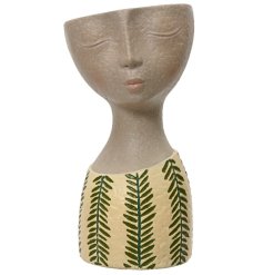 Bring charm and fun to your space with this unique head planter.