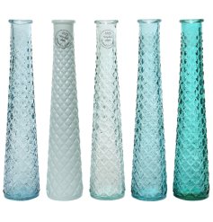 Eco-friendly elegance for any space, our Recycled Glass Tall Vase is beautifully repurposed.