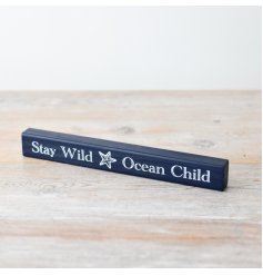 "Nautical-themed wooden block ornament features navy color scheme, starfish design, and ocean-inspired wording."