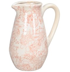 a stylish jug vase, adored with cute pink flowers