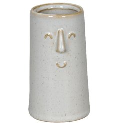 add some fun to your space with this smiley face planter 