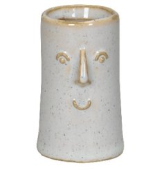 Add a touch of charm and elegance to your home decor with our Small Fave Vase. 