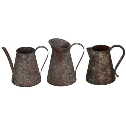 3/A Rustic Metal Jugs 