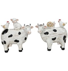 Add some farm-fresh flair to your decor with our charming Cow Ornament