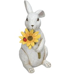 Add a touch of whimsical elegance to your home with our charming rabbit with flower deco