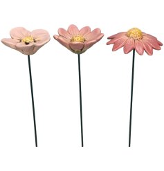 Enhance your garden with these charming flower stakes, perfect for adding a colorful touch to your outdoor space.