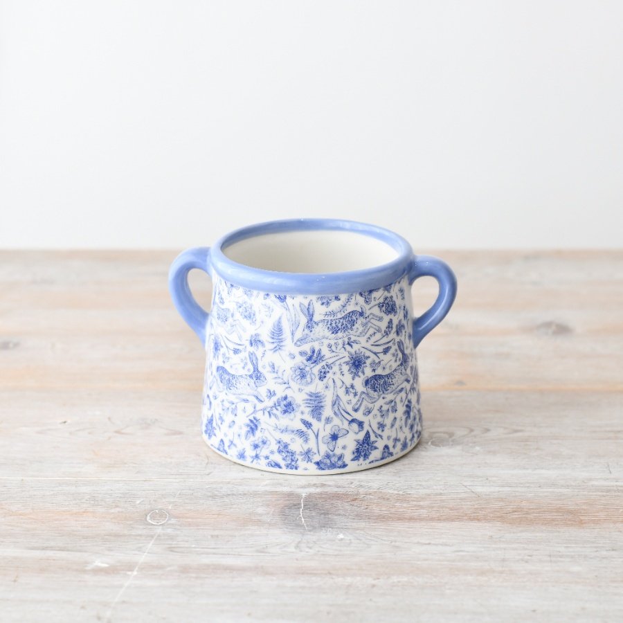 Enhance your living space with our lovely Blue Hare Floral Pot 