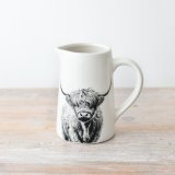 add some country charm to your table top with this cow jug