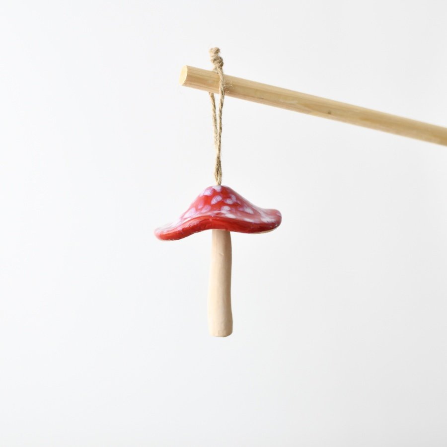 Add rustic charm to your decor with this delightful mushroom hanger.