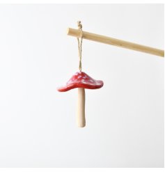 Bring rustic charm to your décor with this charming mushroom hanger