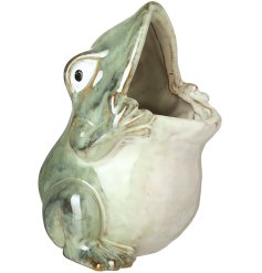 Add quirkiness to the home with this glazed frog ornament. 