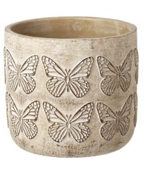 "Add a touch of beauty to your space with our unique butterfly-themed planter. A must-have for any nature lover! 