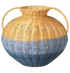 Bring natural charm and functionality into your home with this rattan pot 