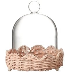 a stunning glass cloche with a pink woven base 