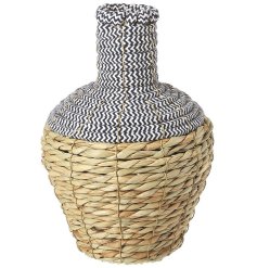 Beautifully crafted vase with a chic wicker pattern adds elegance to any floral arrangement.