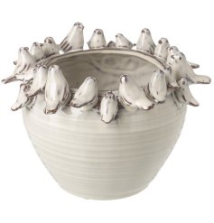 "Beautiful reactive glaze pot adorned with delicate birds. Decorative and functional. 