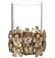 Add a touch of charm and warmth to your home with this stylish candle holder