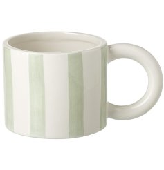 Stylishly crafted, this chunky mug features green and white stripes, making it a stunning addition to your kitchen.