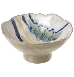 Enhance your space with our beautiful porcelain bowl in elegant white and blue hues. 