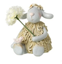 Meet our newest decor addition, the Sitting Sheep Holding Flower figurine 