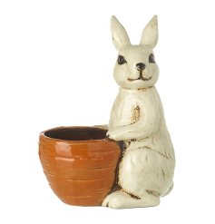 Add some charm to your space with our Pottery Bunny and Carrot Pot.