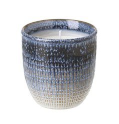 Transform your space with our enchanting coastal-themed wax candle pot.