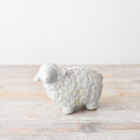 Elevate your home decor with this adorable standing sheep decoration, featuring a natural touch. 