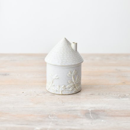 Bring elegance and charm to your home with our stunning porcelain house ornament, 