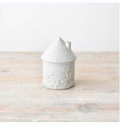 Bring elegance and charm to your home with our stunning porcelain house ornament, 