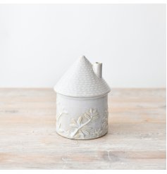 create homely  vibe with this cute house ornament