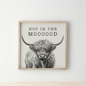 "Add character to your space with this charming wooden frame showcasing a shaggy highland cow and scripted text above.